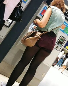 Girl with nice booty in maroon shorts and stockings