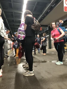 Teen Girl in Tights And Sneakers Standing on the Train Platform VPL Photos