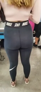 Fit girl in Nike black leggings at Walmart