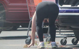 Redhead milf with a nice ass and vtl in leggings while loading her car