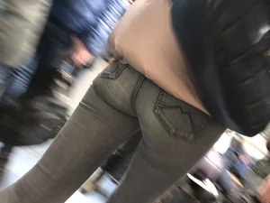 Some extremely lean and firm ass in tight grey jeans in a subway train closeup creepshots