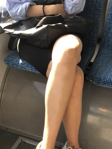 Candid girl sitting in a bus hot legs closeups