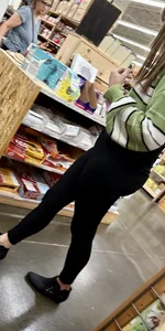 Great ass on this cutie with bangs, bending over and squatting down