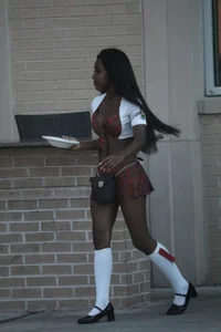 Sexy ebony Tilted Kilt employee in her uniform