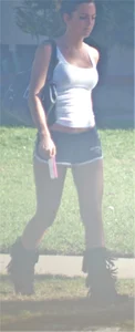Skinny babe going to her car in little cotton shorts