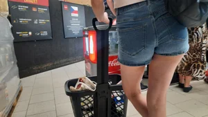 Tight shorts bend over in shop
