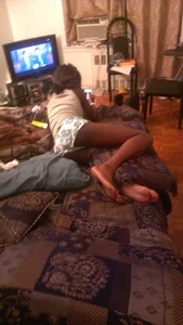Black sexy girlfriend laying around in little shorts