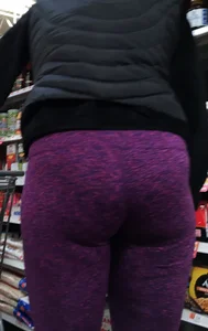 Milf shopping with a nice ass in purple leggings
