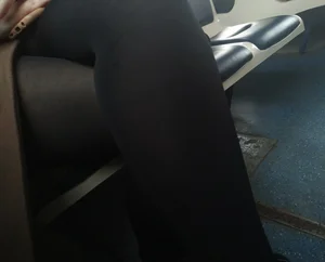 Girl in a Coat and Black Pantyhose - Crossed Legs Closeups in the Public Train