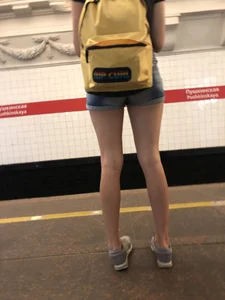 Cute Skinny Teen in Jean Mini Shorts Standing on the Subway Platform