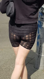 Skinny candid girl's booty in amasing semi-transparent shorts, her panties visible