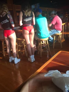 Candid sexy Hooters girls in their uniforms