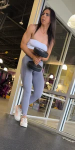 Gym brunette with a deep camel