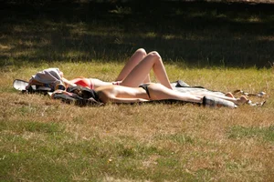 Creepshots of some girls in the park getting some sun in bikinis