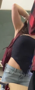 Sexy teen wearing skimpy top