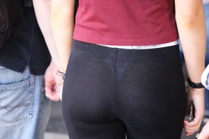Sweet little brunette shows off her sexy Calvin Klein thong