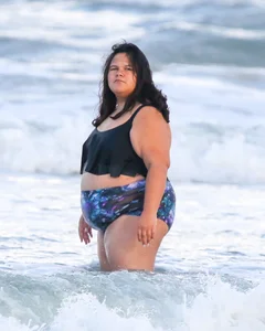 Extra thick girl at the beach in a bikini