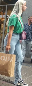 Blonde girl wearing blue jeans with a great ass street creepshots