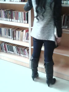 Candid Girl in Tight Blue Jeans And High-Heeled Knee-High Boots at the Public Library Creepshots