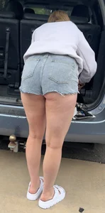 College chick in short shorts bending over with cheeks out