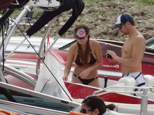 Party girls looking sexy out on boats in bikinis