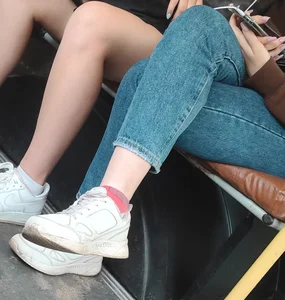 Hot teen girls' legs in public transport closeup creepshot: jeans and shorts