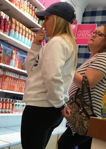 Thick blonde shopping in leggings with a nice booty