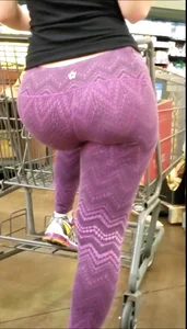Thick Blonde in purple leggings