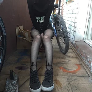 Teen With Skinny Legs in Black Fishnet Pantyhose Selfie With Her Bike