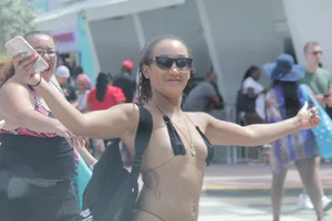 Florida Latina chick in micro thong bikini showing a ton of skin