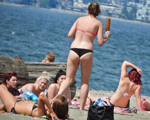 Group of sexy girls in bikinis at the beach