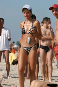 Beach voyeur girls in bikinis, thongs and topless