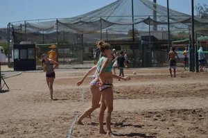 Beach volleyball blonde looking sexy and showing her body off