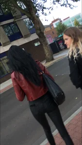 Chav brunette with a nice ass and vpl in tight black leather pants