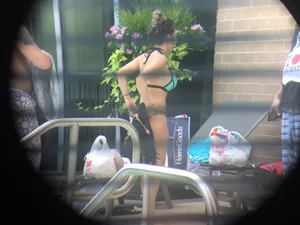 Hot girl at the pool in her bikini with big tits
