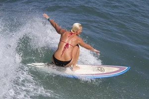 Candid surfer babes on the beach and in bikinis