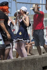Girl in sailor costume flashes her tits quickly