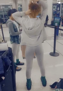 Sexy skinny girl in grey leggings