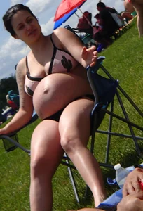 Two thick pregnant girls in bikinis