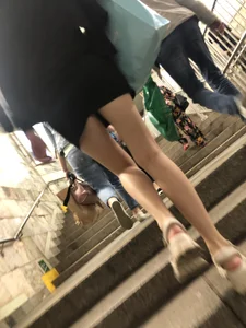 Amazing long and skinny legs (and feet in sandals) in subway