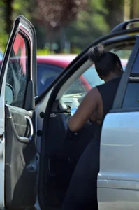 Chubby black lady with big tits and no bra lets it slip