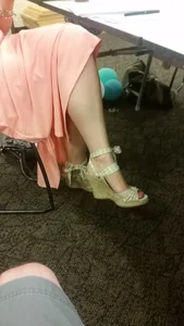 Girl's Crossed Legs in High-Heeled Sandals under Table Office Creepshot