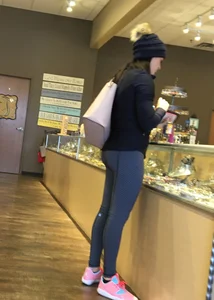 Brunette jewelry shopping in leggings with a nice ass