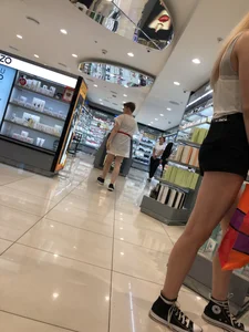 Blonde in Mini Shorts with Hot Legs Store Creepshots