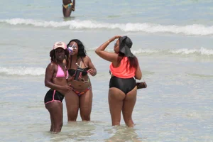 Ebony beach and bikini girls