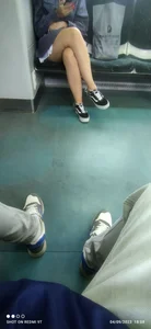 Cute candid girl with nice legs sitting with crossed legs in a public bus creepshots