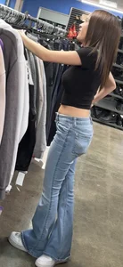 Petite Asian ho showing off tramp stamp & bubble butt
