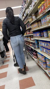 Sexy Asian girl grocery shopping in tight jeans with a nice ass