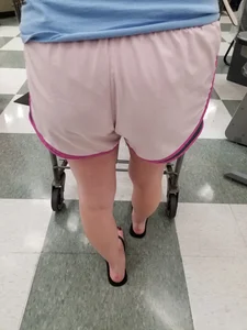 Nice blonde ass in athletic shorts while shopping