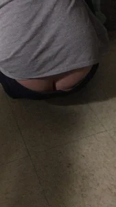 Chunky Ass Cheeks Seen From Under Jeans - Girl Sitting on the Floor Closeup Creepshot